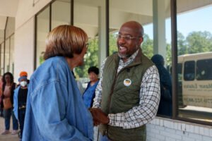 Can Scott Colom win Mississippi Senate? Warnock is making a big bet on it.